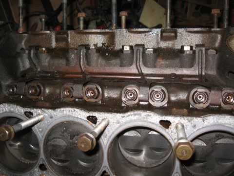 1994 Ford Bronco - Close-up view of an engine block, showing internal components and signs of wear.