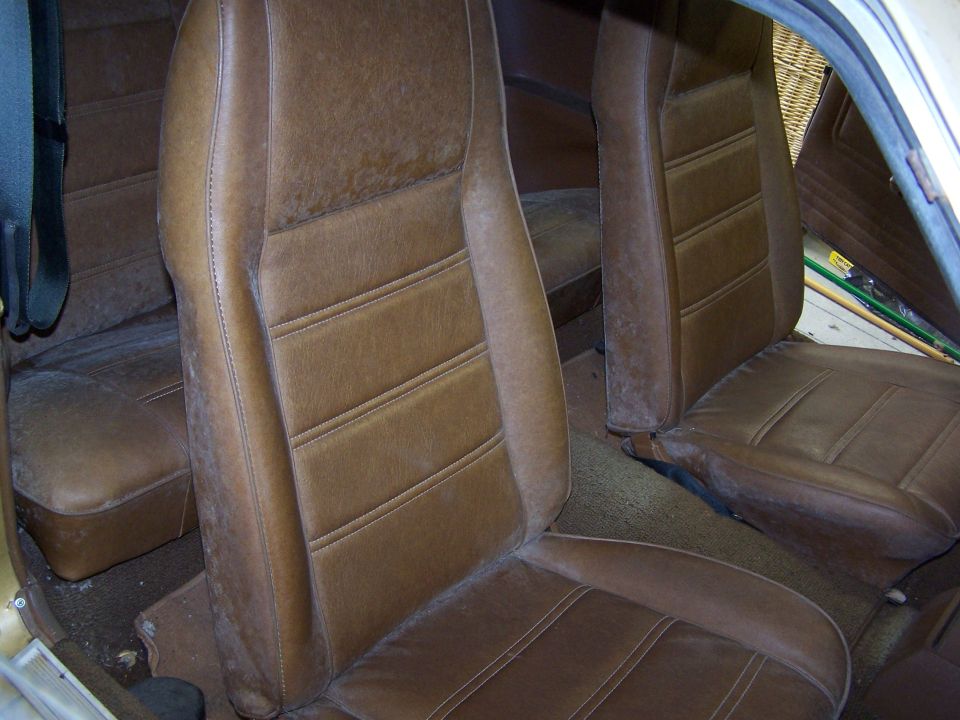 The seats are in mint condition.  No rips or tears anywhere.  This is original vinyl!