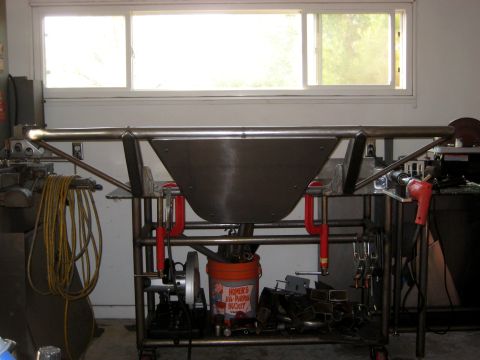 1996 Ford Bronco - Custom metal bumper fabrication in progress, showing the structure and welding clamps.