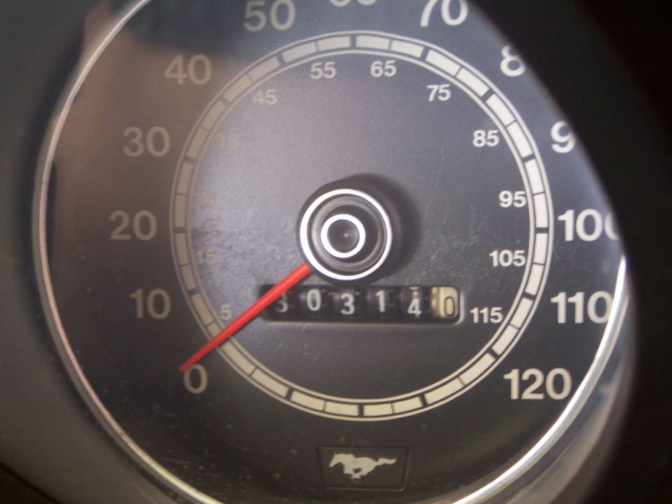 30,314 original miles.  This car stil has the original tires on it!  (Although they are worn and dry rotted!)