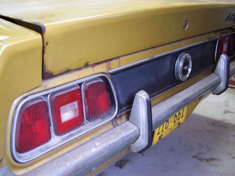 1972 Ford Mustang - The rear bumper is pitted and it could use new tail light bezels. Otherwise, no rust on the rear apron or trunk sides.