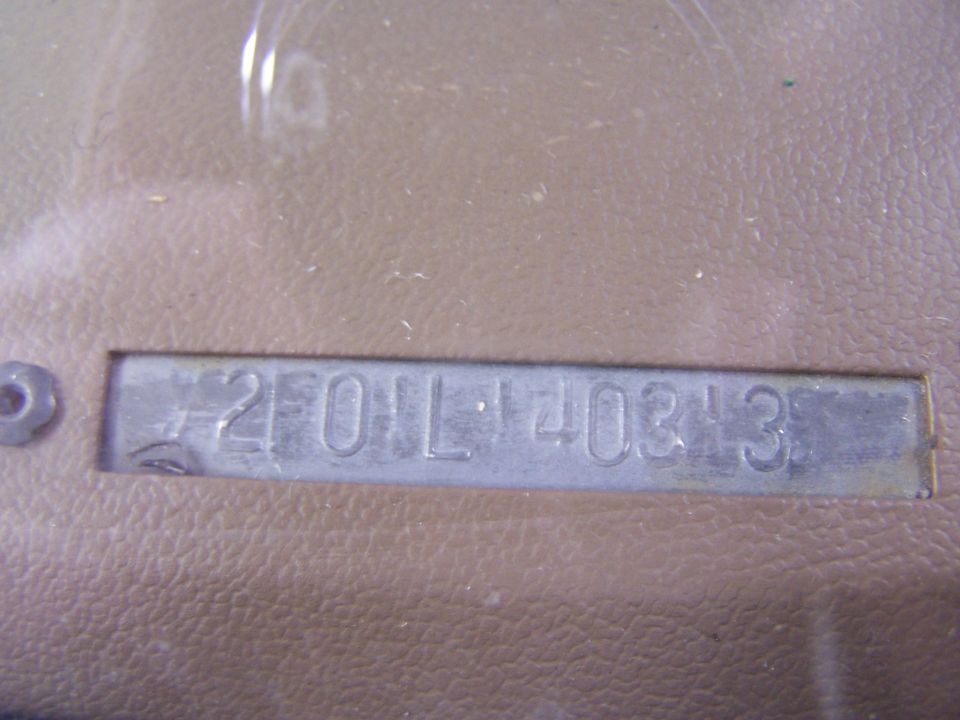 Vin plate still intact on the dash.