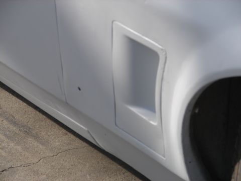 1973 Ford Ranchero - Close-up of a side vent on a vehicle, showing bodywork details.