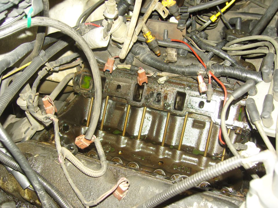 Engine intake manifold with fuel injectors and wiring