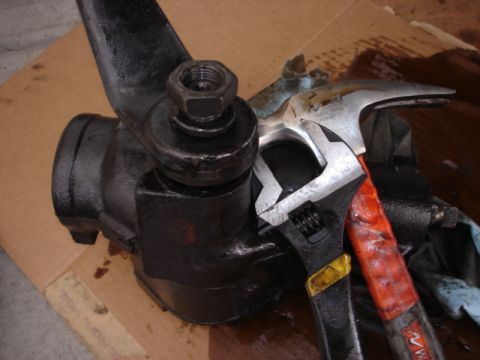 1992 Ford Bronco - Steering gear assembly with adjustable wrenches, likely during a repair or maintenance process.