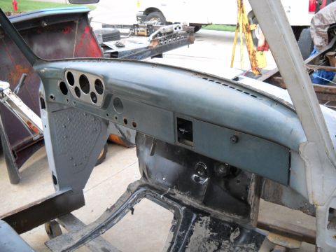 1954 Ford F-100 - Interior view of a 1954 Ford F-100, showing the dashboard with its characteristic round gauge cluster.