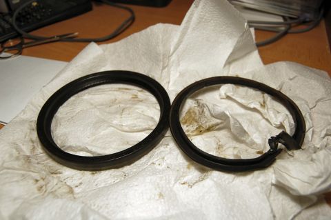 1985 Mercury Grand Marquis - Two oil seals, one intact and one damaged, are shown on paper towels.