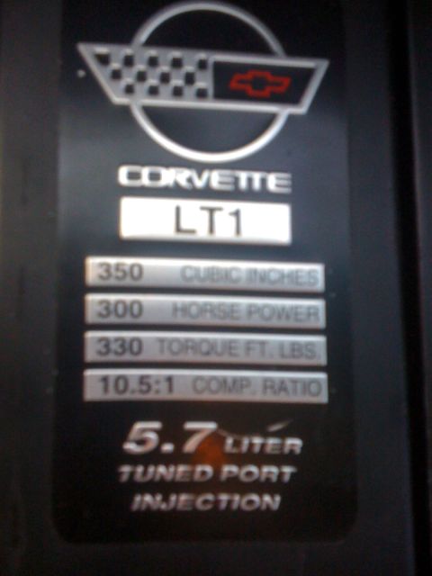 1995 Ford Bronco - Corvette LT1 engine data plate details horsepower, torque, and displacement.