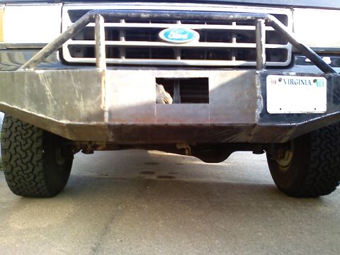 1990 Ford Bronco - Custom bumper on a Ford truck, likely from the 1980s, with a Virginia license plate.