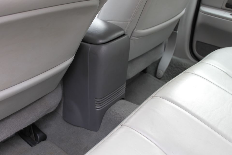 2003 Ford Crown Victoria interior showing rear seats and center console
