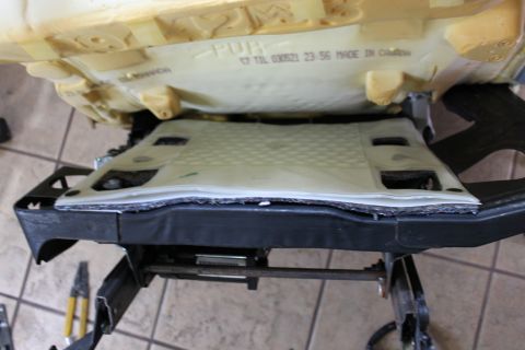 2007 Ford Crown Victoria - the 2007 occupancy sensor pad installed and tabbed in place in the 2003 LX seat frame.