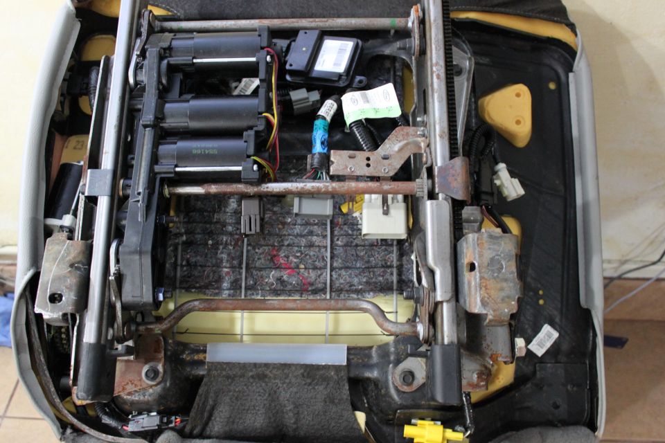 wiring is in place and lined up over the 2003 harness. i didnt remove the 2003 harness and the seat still functions 100% stock with both in place as seen above.