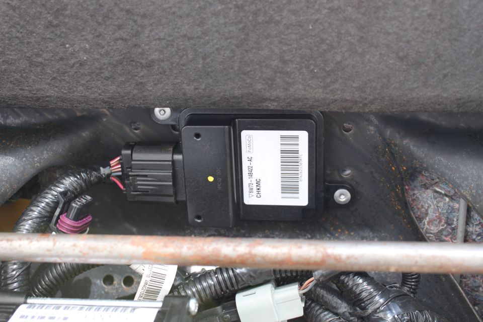 2007 restraint control module riveted in place to the 2003 LX seat frame in the same spot as the 2003 RCM was in.