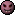 1990 Ford Bronco - This is a very low-resolution image of a face against a pink background.