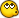 1990 Ford Bronco - A close-up of a yellow smiley face emoji with large, expressive eyes.