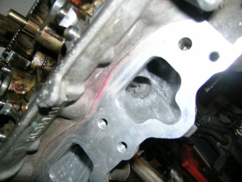 1995 Ford Probe - Engine cylinder head port detail, showing internal components and machining marks.
