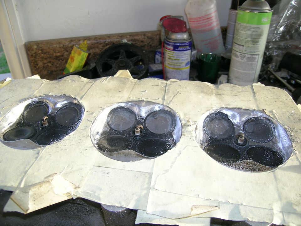 Engine cylinder heads with valves and springs