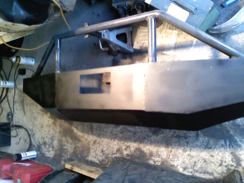 1990 Ford Bronco - A fabricated brushguard is shown in a workshop setting, possibly for an off-road vehicle.
