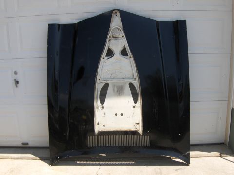 1980 Chevrolet Camaro - This is a car hood, likely for a classic muscle car, shown from the underside.