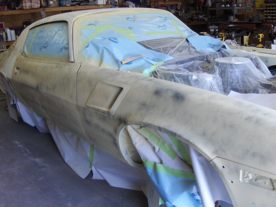 1980 Chevrolet Camaro body in primer, taped off for paintwork