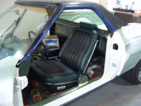 1973 Ford Ranchero - Interior view of a 1973 Ford Ranchero, showing the driver's seat and dashboard area.