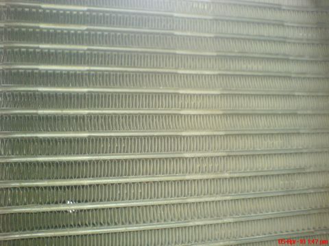 1998 Ford Crown Victoria - Close-up view of the fins on a car's radiator.