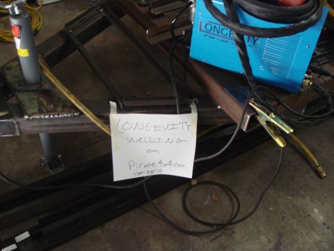 1992 Ford Bronco - A welding setup is shown with a sign indicating the user and website.