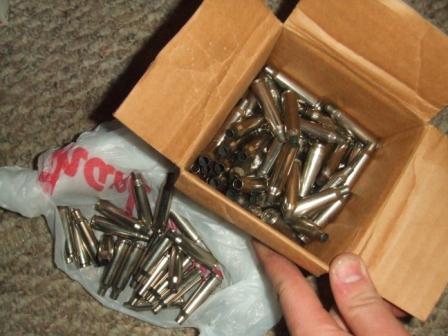 1996 Ford Bronco - Spent bullet casings are visible in a box and bag, with a watermark for Supermotors.net.