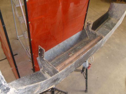 2000 Dodge 1500 - Custom bumper fabrication in progress, with a welding screen in the background.