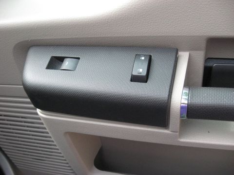 2008 Ford F-250 - Interior door panel detail with window and lock controls.