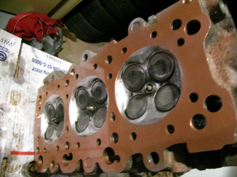 1995 Ford Probe - Close-up of an engine cylinder head, showing the gasket and valves.