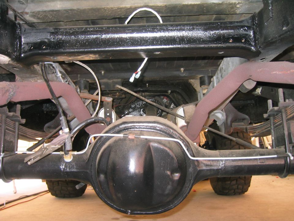 Rear axle and suspension underside of a truck