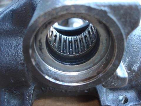 1992 Ford Bronco - A detailed view of a splined shaft and its housing, likely a component from a vehicle's drivetrain or steering system.