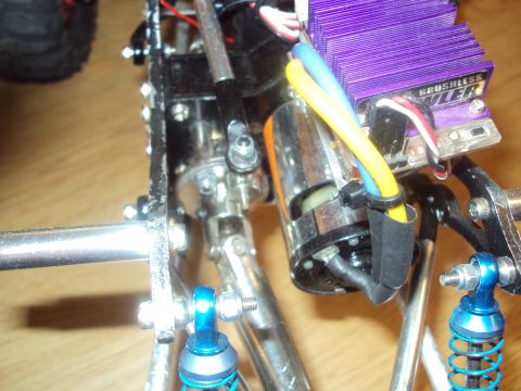 1992 Ford Ranger - Close-up view of an RC car's chassis, showing its mechanical and electronic components.