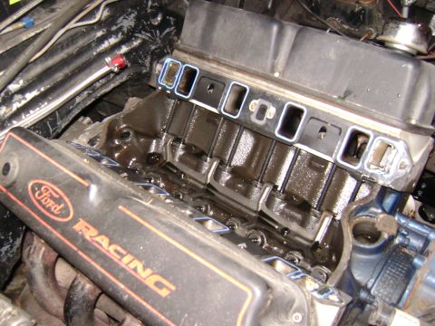 1981 Ford Mustang - Close-up of Ford Racing engine components, likely during a rebuild or repair.