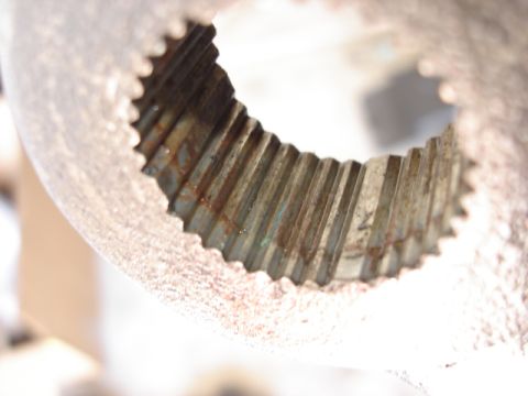 1992 Ford Bronco - Close-up view of heavily rusted gear teeth, showing wear and corrosion.