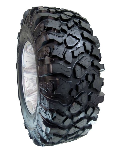 1989 Ford Bronco - This image shows an off-road tire with a distinctive tread pattern and a chrome wheel, suitable for terrain.