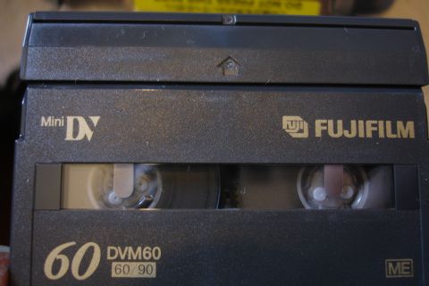 1993 Ford Taurus - A close-up view of a Fujifilm Mini DV tape, labeled DVM60.