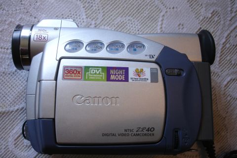 1993 Ford Taurus - A Canon digital video camcorder is shown with various feature labels, including 360x digital zoom and night mode.