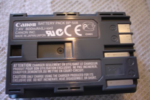 1993 Ford Taurus - Canon BP-508 battery pack details: 7.4V 800mAh (Li-ion), made in Japan. Includes caution and attention warnings.