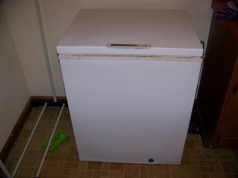 2001 Dodge 1500 - Chest freezer is the main subject in this indoor scene.