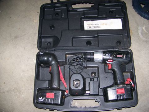 2001 Dodge 1500 - A Craftsman 18.0 volt cordless drill and flashlight set is neatly organized in its carrying case.