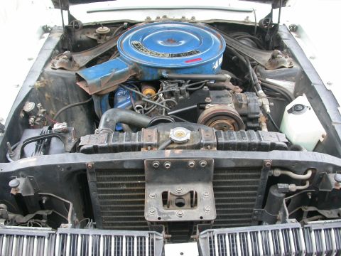 1968 Mercury Cougar - The engine bay of a 1968 Mercury Cougar, its V8 engine and air cleaner assembly.