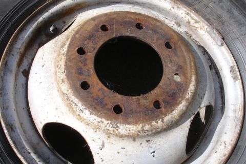 1993 Ford Taurus - This is a close-up view of a heavily rusted wheel rim, showing signs of wear and tear.