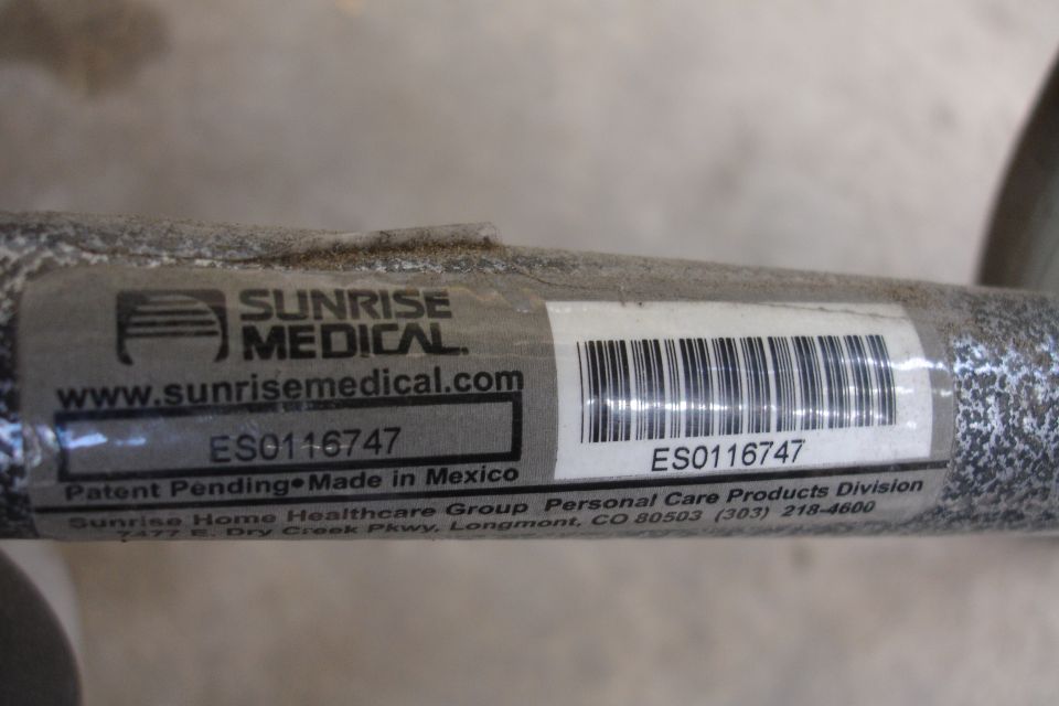 Label on metal tube reads Sunrise Medical, www.sunrisemedical.com, ES0116747, Patent Pending Made in Mexico, Sunrise Home Healthcare Group Personal Care Products Division, 7477 E. Dry Creek Pkwy, Longmont, CO 80503 (303) 218-4600