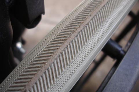 1993 Ford Taurus - A detailed view of a tire's tread pattern and sidewall texture, highlighting its design and condition.