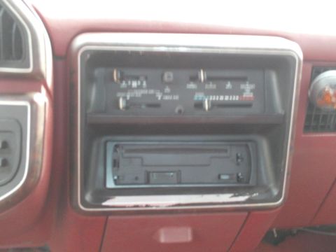 1988 Ford Bronco - The interior of a 1988 Ford Bronco features its original climate controls and radio unit.