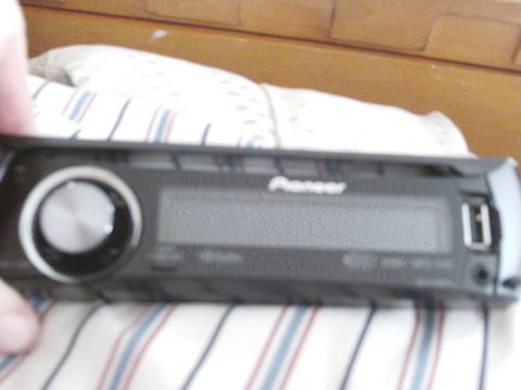 1988 Ford Bronco - Pioneer car stereo head unit with USB port and display screen.