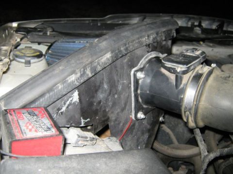 2000 Mercury Grand Marquis - Close-up of the engine's air intake system, showing the air filter and associated components.