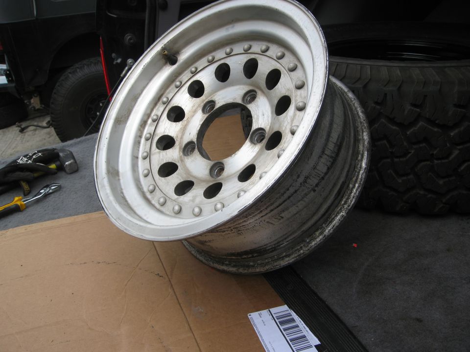 Aluminum wheel with multiple holes and a tire
